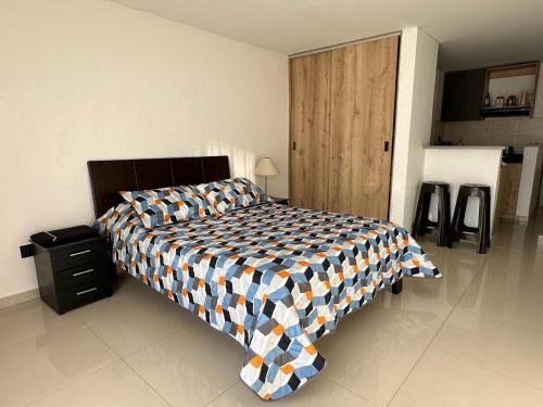 Ein Bett oder Betten in einem Zimmer der Unterkunft Apartamento edificio Castellana