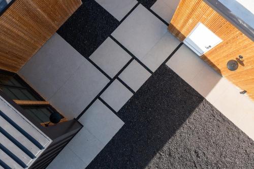 an overhead view of a building with black and white floor at The Lunawood - Lux Home Pool and Spa in Joshua Tree