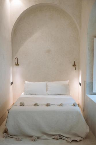 Riad Le Sable Vert tesisinde bir odada yatak veya yataklar