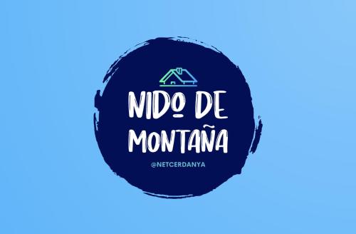 un logo pour une station de montagne en bleu dans l'établissement Apartamento ideal para parejas en Enveitg, à Enveitg