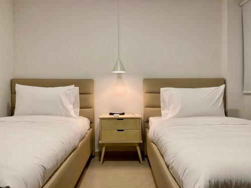 Postel nebo postele na pokoji v ubytování Bocagrande Comfort Stays