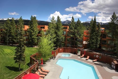 an overhead view of a swimming pool with a resort at Huntley Lodge at Big Sky Resort in Big Sky