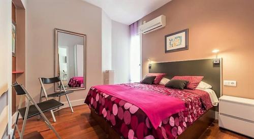 מיטה או מיטות בחדר ב-Gran Vía 55 - Excellent Apartments