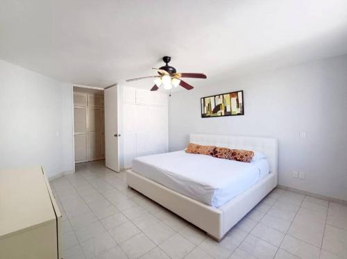 Postel nebo postele na pokoji v ubytování Espacioso departamento en Cancún