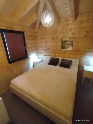 Ένα ή περισσότερα κρεβάτια σε δωμάτιο στο Ferienhaus Merlin