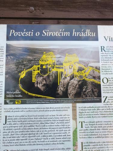 a newspaper article with a picture of a yellow bridge at Ubytování nad sklípkem in Valtice