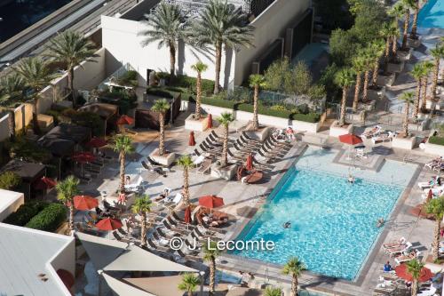 an overhead view of the pool at the resort at No Resort Fee Strip View Balcony+Free Valet+ Pool in Las Vegas