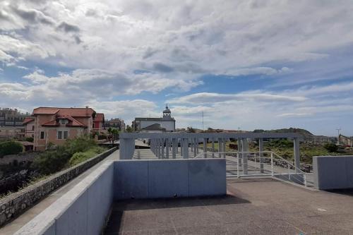 a view of a city from the roof of a building at Gestiona2R - Apartamento en el casco antiguo Llanisco in Llanes