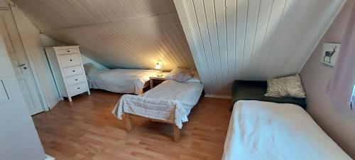 En eller flere senger på et rom på Family home Stavanger