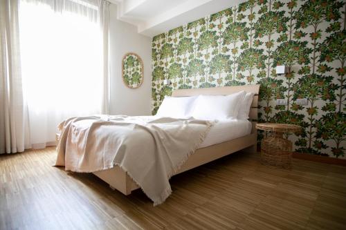 Posteľ alebo postele v izbe v ubytovaní Ai Ronchi B&B