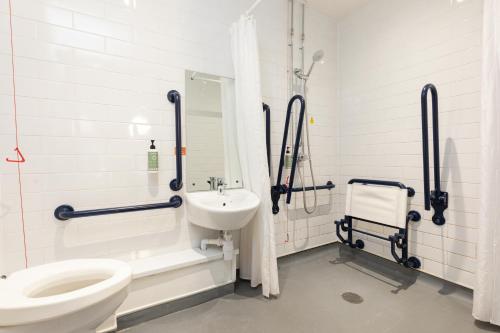 a bathroom with a toilet and a sink at easyHotel Glasgow City in Glasgow