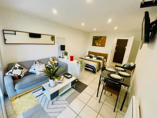 Posedenie v ubytovaní Studio Rénové au calme avec Terrasse Trouville