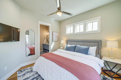 a bedroom with a large bed and a television at Cozy Carlton Landing Home - Pools and Lake Access in Canadian