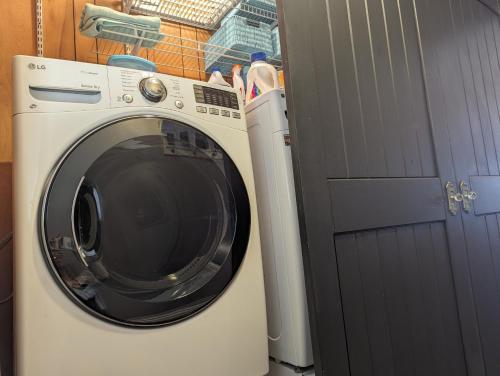 a washing machine sitting next to a washer at Robbins Nest in South Toledo Bend