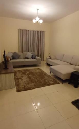 Suit Appartment - Ajmanにあるシーティングエリア