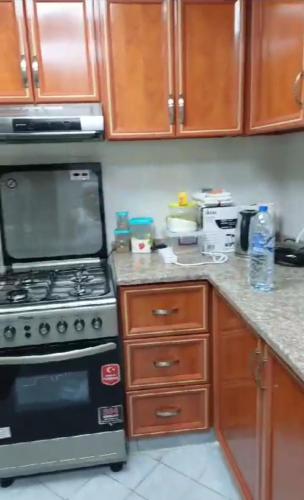 Suit Appartment - Ajmanにあるキッチンまたは簡易キッチン