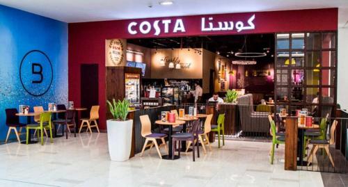 Restaurant o un lloc per menjar a DUBAI MALL METRO Executive room