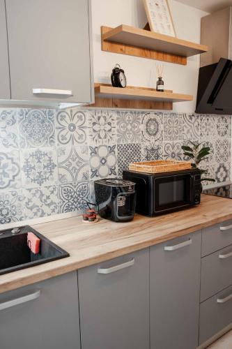 Η κουζίνα ή μικρή κουζίνα στο Bliss Apartment