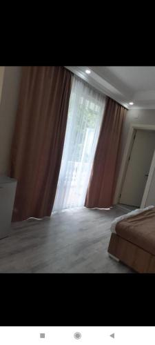 Gallery image of Geno Guest House in Kvariati