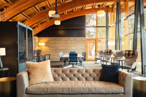 a living room with a couch and a table at Gravity Haus Truckee-Tahoe in Truckee