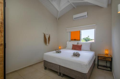 Postel nebo postele na pokoji v ubytování JT Curacao Apartments