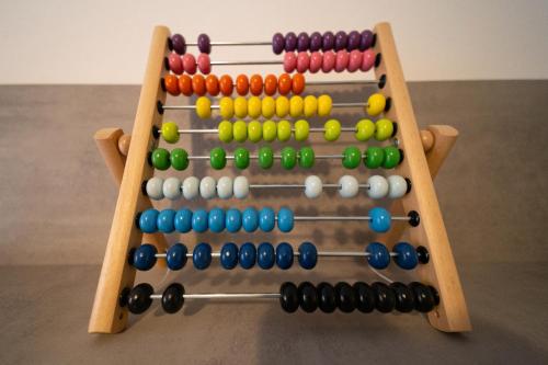an old wooden abacus with colorful beads at Casa di Jennifer 3 in Parma
