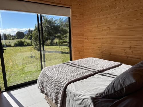 Ένα ή περισσότερα κρεβάτια σε δωμάτιο στο Cabaña Negra