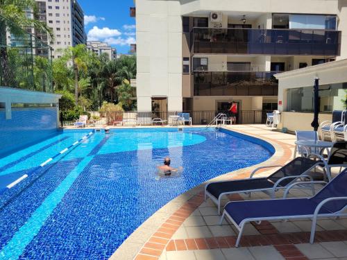 Swimmingpoolen hos eller tæt på Apartamento Boutique Barra da Tijuca Península