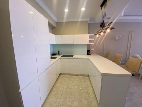 A kitchen or kitchenette at Baku - Park Azure with sea view two bedrooms and one living room