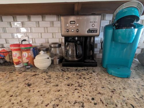 a coffee maker sitting on top of a counter at Robbins Nest in South Toledo Bend