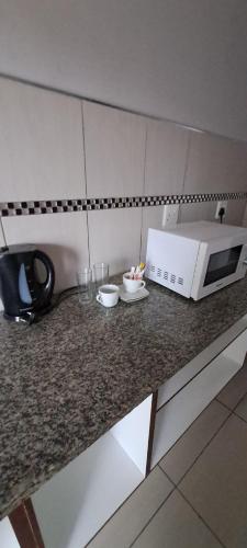 Η κουζίνα ή μικρή κουζίνα στο Matat Studio Apartments