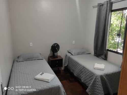 Ένα ή περισσότερα κρεβάτια σε δωμάτιο στο IDEAL HOTEL