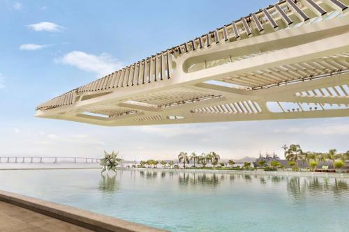 a rendering of a building with a pool at Hilton Copacabana Rio de Janeiro in Rio de Janeiro