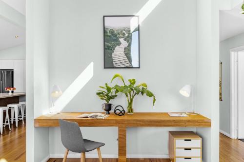 a home office with a desk and a chair at Jervis Bay Sanctuary by Experience Jervis Bay in Vincentia