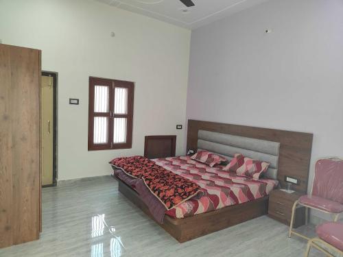 Super OYO Sree Krishna Hotel &Resort房間的床