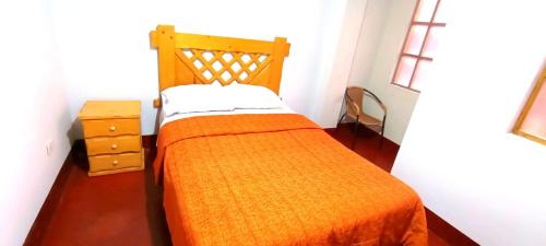 Cama o camas de una habitación en Andes Hostel