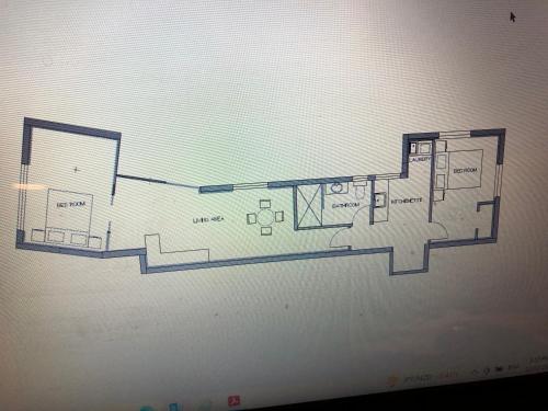 a drawing of a floor plan on a wall at Vista - touch of country and hot Spa in Havelock North