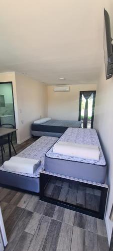 En eller flere senge i et værelse på Atardecer Soñado