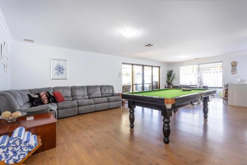 a living room with a pool table in it at Singleton Impressions - EXECUTIVE ESCAPES in Singleton