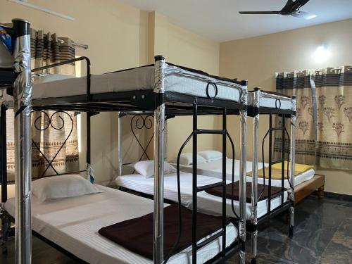 Кровать или кровати в номере P A Resort