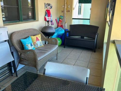 a living room with two chairs and a couch at 3 Bed 2 Bath 2 Parking 5 pools in Loiza