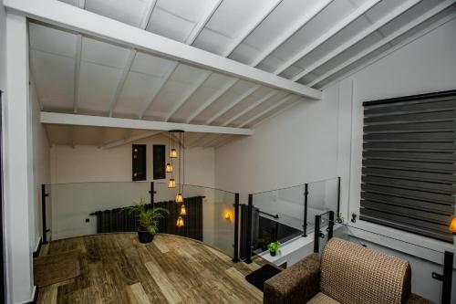 an open living room with a white ceiling at The Castle By Scenic Weligama in Weligama