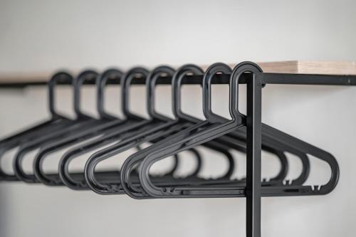 a row of white plates on a rack at Taitung Spring Homestay B&B in Taitung City