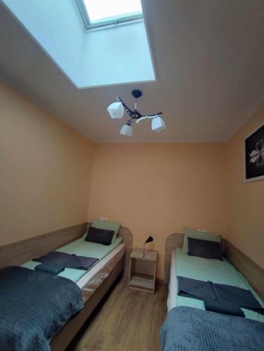 Postel nebo postele na pokoji v ubytování Restauracja "AS"- Noclegi