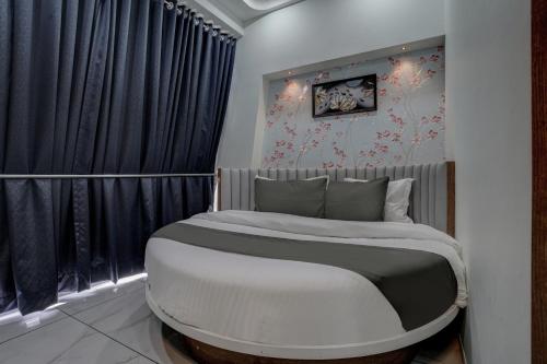 Katil atau katil-katil dalam bilik di Hotel Paris inn