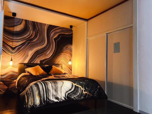 Una cama o camas en una habitación de ボーマンボウ 呆呆的翻车鱼 Mola Mola