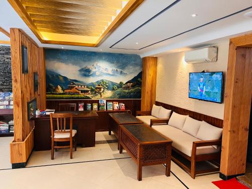 Televisyen dan/atau pusat hiburan di Maya Boutique Hotel