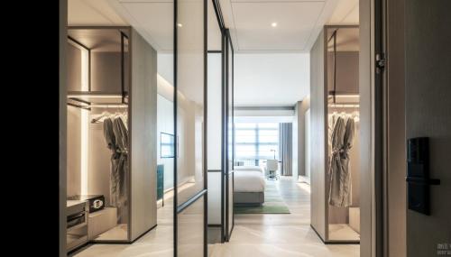 Una cama o camas en una habitación de 深圳英威斯顿酒店 Investon Hotel Shenzhen