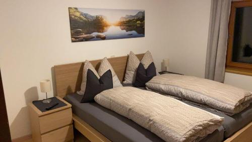 a bedroom with two beds at Ferienwohnung Dornau in Langkampfen