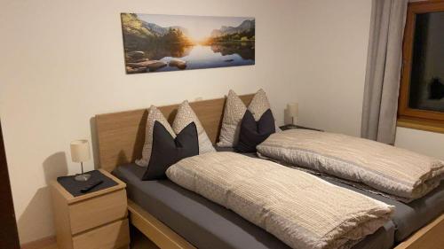 A bed or beds in a room at Ferienwohnung Dornau